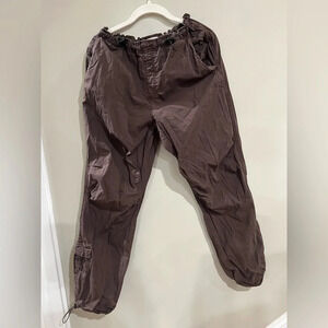 Brown cargo pants with multiple pockets, straight leg style